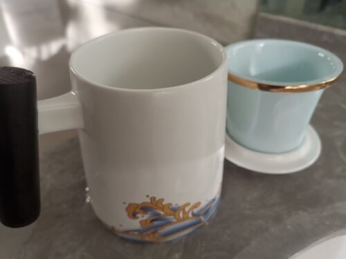 Click to view full screen Tumbling Waves Tea Mug with Infuser and Lid 15 OZ photo review