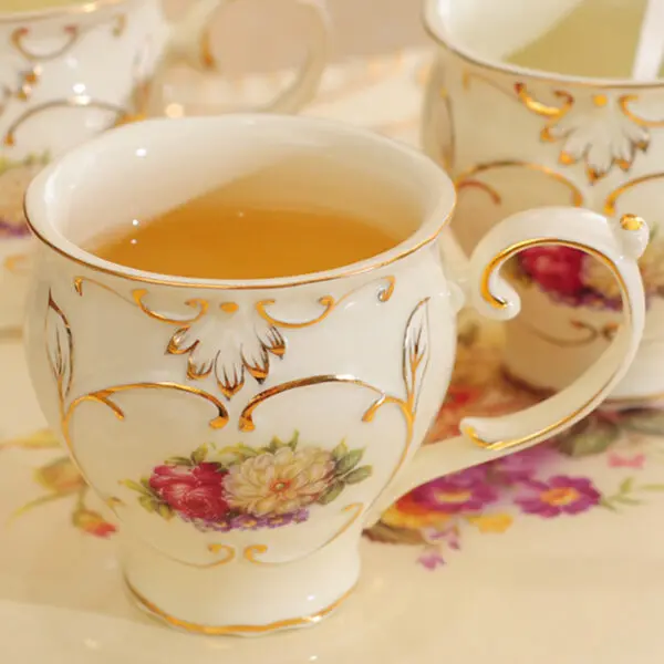 Rose quartz tea set - exquisite carving of a tea kettle and 4 tea cups
